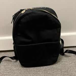 Lo & Sons Sleek Black Backpack with Gold Zippers